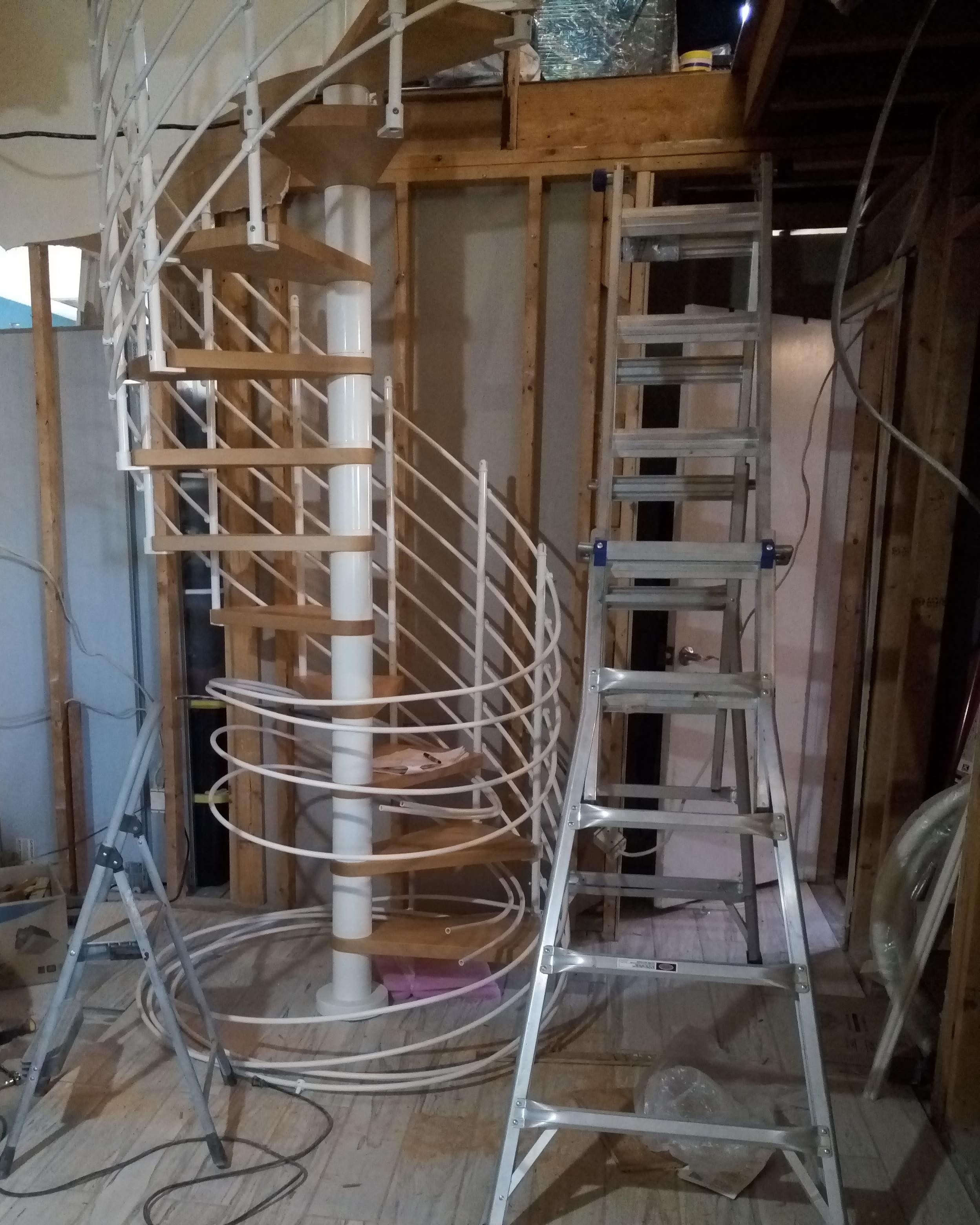 Spiral staircase railings going up